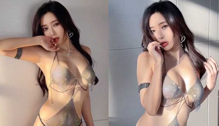 极品巨乳御姐身材好，晃着大奶拍摄性感沙龙